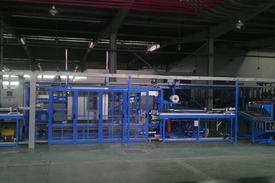 Sistema de apilamiento y máquina paletizadora MD-1