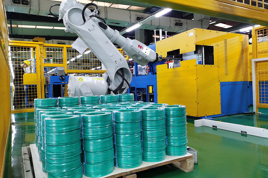 Sistema de apilamiento de robots y máquina paletizadora IRB460